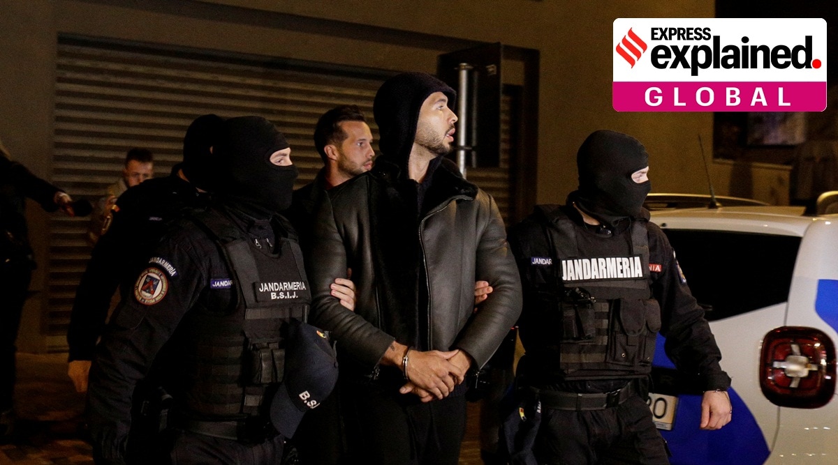 Andrew Tate and Tristan Tate are escorted by police.