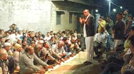 A video grab of Visavadar MLA Bhupendra Bhayani addressing a public meeting in Bhesan, Junagadh, Monday.