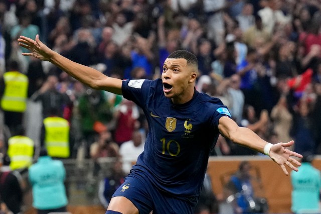 France's Kylian Mbappe celebrates scoring from the penalty spot his side's third goal during the World Cup final soccer match between Argentina and France at the Lusail Stadium in Lusail, Qatar, Sunday, Dec. 18, 2022.AP/PTI(AP12_18_2022_000382B)
