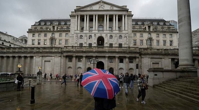 The Bank of England becomes the latest to fall in line with the Fed, which hiked its benchmark rate by the same amount Wednesday. (AP)