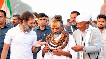 Congress leaders Rahul Gandhi with controversial self-styled godman Namdeo Das Tyagi aka 'Computer Baba' during the party's 'Bharat Jodo Yatra', in Agar Malwa district, Saturday, Dec. 3, 2022. (PTI Photo)