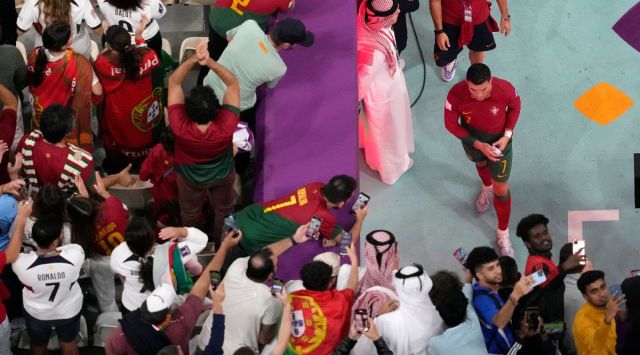 Portugal's Cristiano Ronaldo walks out from the pitch after the World Cup round of 16 soccer match between Portugal and Switzerland, at the Lusail Stadium in Lusail, Qatar. (AP)