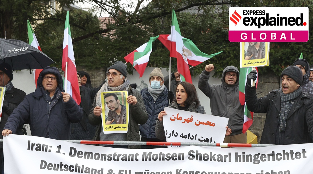 People protest in front of the Iranian embassy in Berlin, Germany, Thursday, Dec. 8, 2022 against the execution of Iranian Mohsen Shekari. Slogan reads: 'Iran: 1st protester Mohsen Shekari executed, Germany and the EU have to take consequences'.