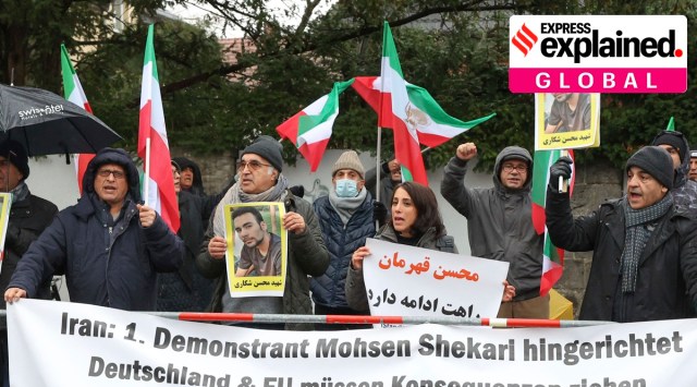 People protest in front of the Iranian embassy in Berlin, Germany, Thursday, Dec. 8, 2022 against the execution of Iranian Mohsen Shekari. Slogan reads: 'Iran: 1st protester Mohsen Shekari executed, Germany and the EU have to take consequences'.