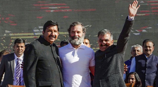 Himachal Pradesh CM Sukhwinder Singh Sukhu (above, right) with Rahul Gandhi and deputy CM Mukesh Agnihotri after taking oath in Shimla on Sunday. (PTI)