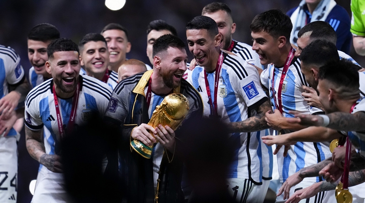 Lionel Messi from Argentina celebrates with the cup after winning