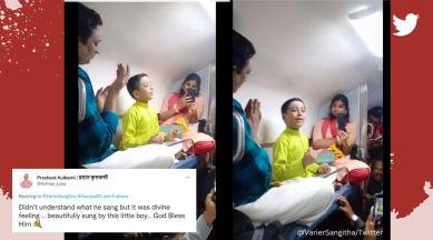 Little boy mesmerises train passengers with soulful rendition of a devotional song, Indian Railways, train, classical song, Tamil, Kashi Tamil Sangamam, viral, trending, Indian Express
