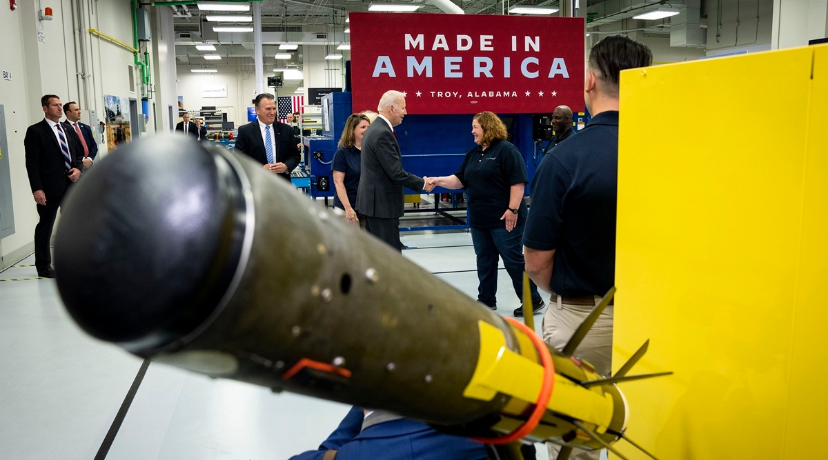 President Joe Biden, center, greets employees on May 3, 2022, at a Lockheed Martin facility in Troy, Ala., that manufactures weapon systems, including Javelin antitank missiles, foreground. (Doug Mills/The New York Times/File)