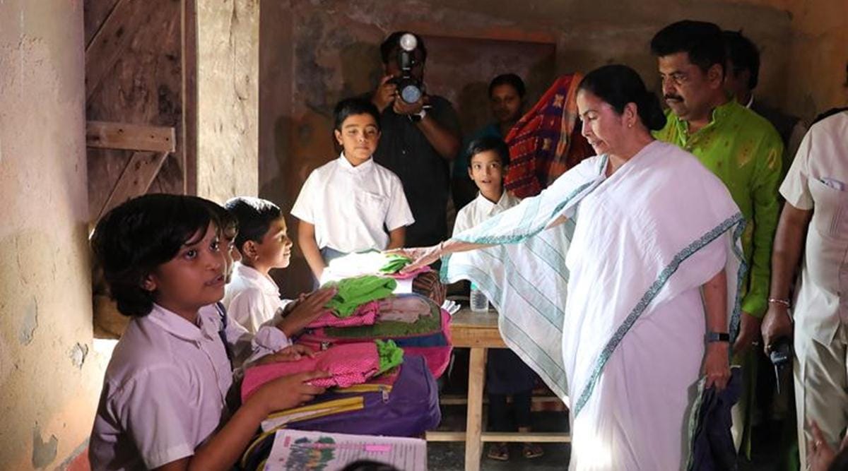 West Bengal CM Mamata Banerjee at Khanpukur FP school
in Hasnabad, North 24 Parganas, on Wednesday. (Express Photo by Partha Paul)