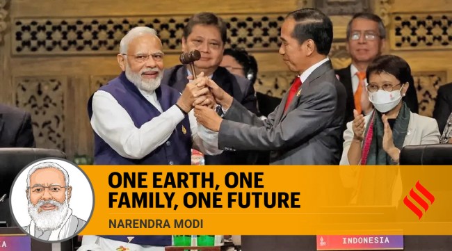 Prime Minister Narendra Modi is handed over the presidency of the G20 group of nations by Indonesia's President Joko Widodo in Bali. (Photo: Reuters)