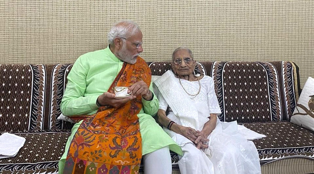 Prime Minister Narendra Modi meets his mother Hiraba at her residence on eve of second phase Gujarat Assembly elections, in Gandhinagar, Sunday, Dec. 4, 2022. (PTI Photo)