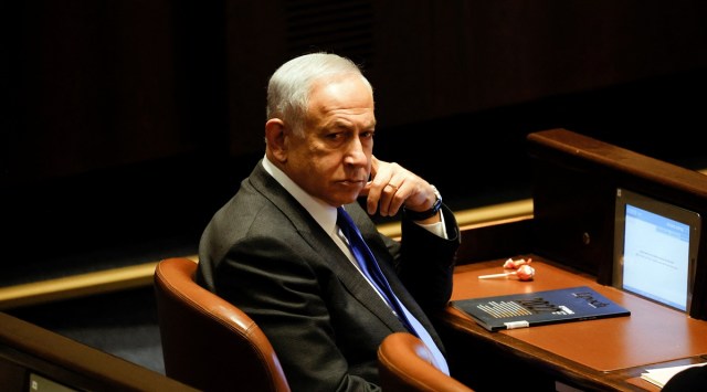 Israeli designate Prime Minister Benjamin Netanyahu attends a session at the plenum at the Knesset, Israel's parliament in Jerusalem December 28, 2022. (Reuters)