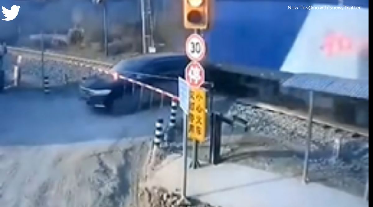 narrow escape, suv driver escapes from getting hit by train, escape from hit by train, accident video, indian express