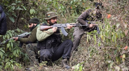 Special Operation Group and Crises Response Team of Jammu & Kashmir Police search a forest area in Bajalta, in Jammu, December 29, 2022. (PTI)