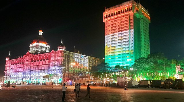 Taj Mahal Palace hotel at Colaba in Mumbai lit up as part of preparations of G-20 summit,  on Tuesday. (Express photo by Pradip Das)