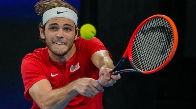 United States' Taylor Fritz plays a backhand return to Jiri Lehecka of the Czech Republic . (AP) 