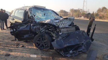 The victims’ car rammed a truck on NH 27 on the outskirts of Gondal town in Rajkot district on Wednesday. (Express Photo)
