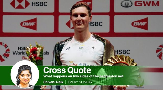 Denmark's Viktor Axelsen celebrates with his trophy after defeating Indonesia's Anthony Sinisuka Ginting during their men's singles final badminton match at the BWF World Tour Finals in Bangkok, Thailand, Sunday. (AP)