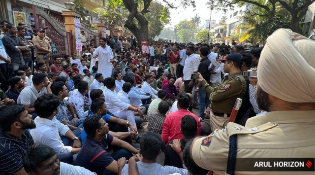 MPSC aspirants protesting against implementation of new test pattern from 2023 at Shastri road, Pune, on Monday. (Express Photo by Arul Horizon)