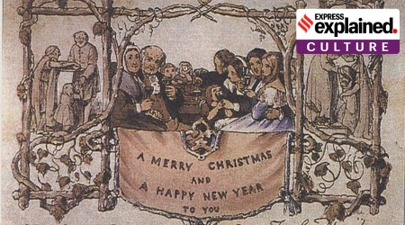 A card illustration showing people celebrating, and a banner reading 'A merry christmas and a happy new year to you'.