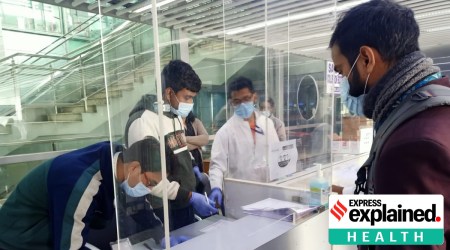 Passengers undergoing random testing for covid at the Delhi airport.