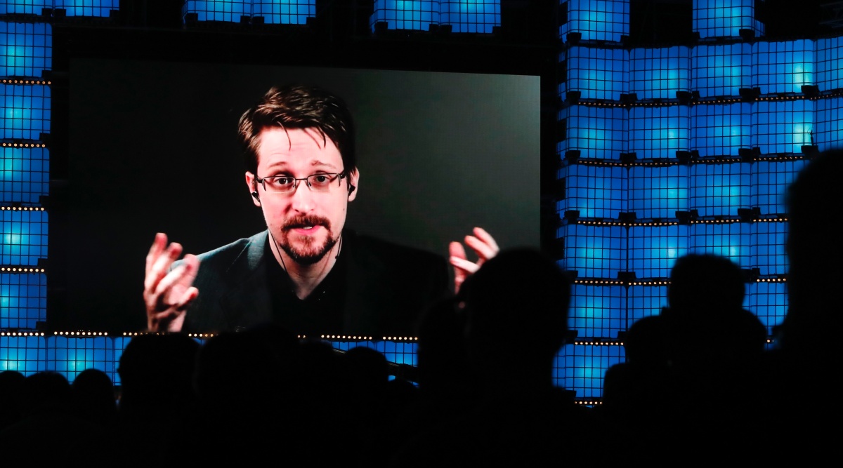 Former U.S. National Security Agency contractor Edward Snowden addresses attendees through video link at the Web Summit technology conference in Lisbon on Nov. 4, 2019. (AP Photo/Armando Franca, File)