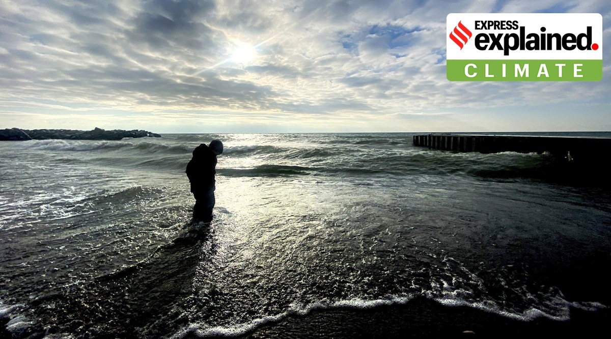 A young boy plays in the surf by the shore of Lake Ontario in Toronto. (AP/File)