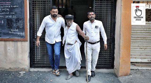 Voting underway at Limbdi village, Surendranagar during phase one of Gujarat assembly elections. (Express photo by Nirmal Harindran)