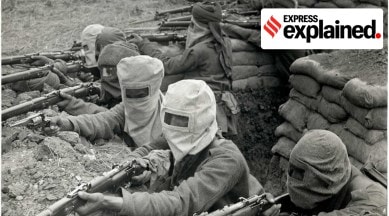 Indian infantrymen in trenches wearing gas masks
