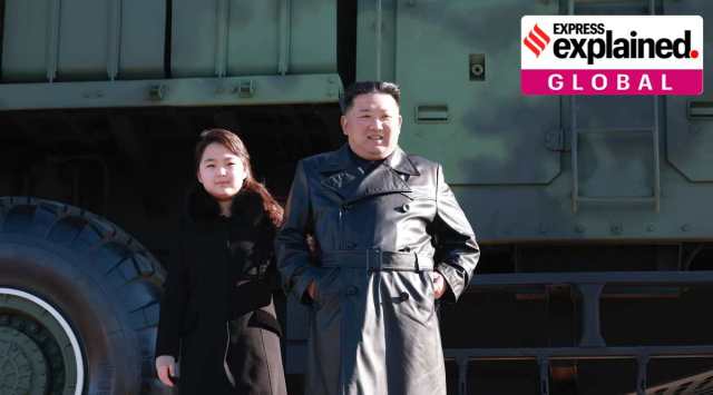 This undated photo provided on Nov. 27, 2022, by the North Korean government shows North Korean leader Kim Jong Un, right, and his daughter, left, posing for a photo, in front of a military truck with what it says a Hwasong-17 intercontinental ballistic missile, at an unidentified location in North Korea. (Photo: Korean Central News Agency/Korea News Service via AP)