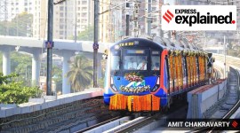 The new metro, from the phase 1 inauguration, running on its tracks and decked with flowers.