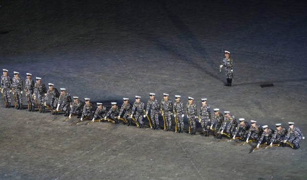 As part of Navy Week celebrations, personnel perform in Beating Retreat ...