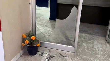 CAPTION-Sarhali police station attacked with rocket launcher in district Tarn Taran on Saturday, December 10 2022.