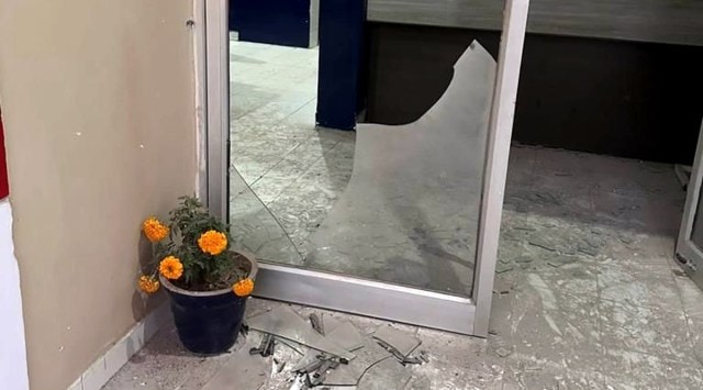 CAPTION-Sarhali police station attacked with rocket launcher in district Tarn Taran on Saturday, December 10 2022.