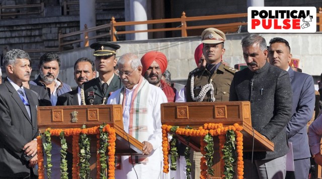 Congress leader Sukhvinder Singh Sukhu being sworn-in as Himachal Pradesh Chief Minister by Governor Rajendra Arlekar at a ceremony, in Shimla, Sunday, Dec. 11, 2022. (PTI Photo)   