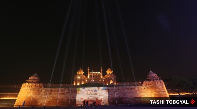 View of an illuminated Red Fort projected with the G20 logo in Old Delhi  (Express photo by Tashi Tobgyal)