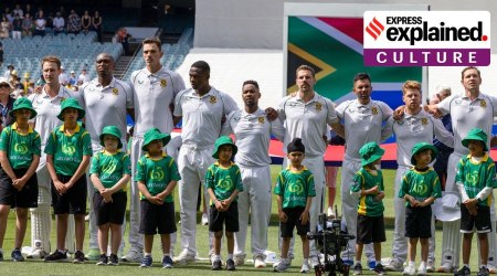 South African players sing their national anthem ahead of play in the Boxing Day test match between South Africa and Australia at the Melbourne Cricket Ground, Australia, Monday, Dec. 26, 2022. (AP Photo)