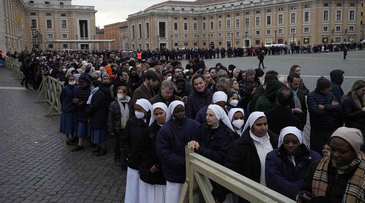 Thousands line up for viewing of Benedict s body at Vatican