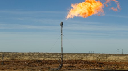 Natural gas being flared at well site north of Odessa, Texas, Jan. 29, 2016. (Michael Stravato/The New York Times)