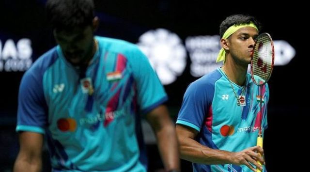 India's Chirag Shetty, right and Satwiksairaj Rankireddy react during their men's doubles semifinals match against China's Liang Wei Keng and Wang Chang at the Malaysia Open badminton tournament in the Bukit Jalil Axiata Arena, Kuala Lumpur, Malaysia, Saturday, Jan. 14, 2023. (AP Photo/Kien Huo)