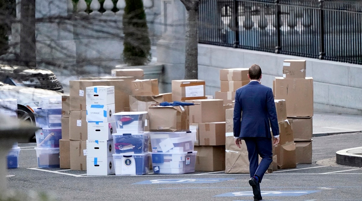 A man walks past boxes that were moved out of the Eisenhower Executive Office building, just outside the West Wing, inside the White House complex, Jan. 14, 2021, in Washington. (AP, file)