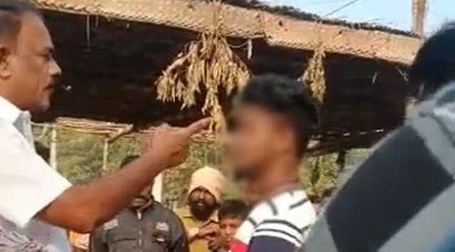 The man abusing the youth in the video has been identified as D Manickam, a secretary of the party’s Salem South Union. (Screenshot/Arranged)