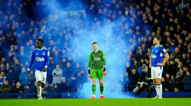 Everton's goalkeeper Jordan Pickford, center, reacts after Brighton's Pascal Gross scored his sides fourth goal during the English Premier League soccer match between Everton and Brighton and Hove Albion at Goodison Park Stadium in Liverpool, England, Tuesday, Jan. 3, 2023. (AP Photo/Jon Super)