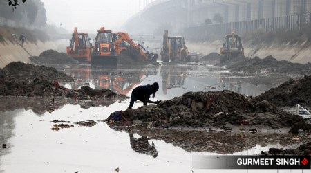 Amid rising concern over garbage dumped in the water body, which moves through the city, MC has stepped up to clean the canal in coordination with the irrigation department. (Express/Gurmeet Singh)