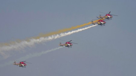 Helicopters of Sarang display team of the Indian Air Force fly-past during rehearsals for the Republic Day Parade in Delhi on Thursday. (PTI)