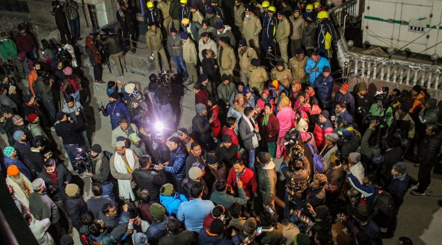 Locals protest against the demolition of unsafe hotels and houses in Joshimath, Tuesday. (PTI)