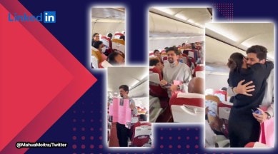Air India proposal, Man proposes to his fiancée mid-air on Air India flight to Mumbai, Air India airlines, man proposes on flight, passengers cheer, couple, viral, trending, Indian Express
