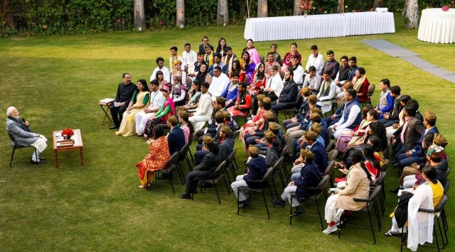 Prime Minister Narendra Modi interacts with youngsters selected to participate in a ceremony to honour Netaji Subhas Chandra Bose in Parliament on Parakram Diwas, at 7, Lok Kalyan Marg, in New Delhi, on Monday. PTI