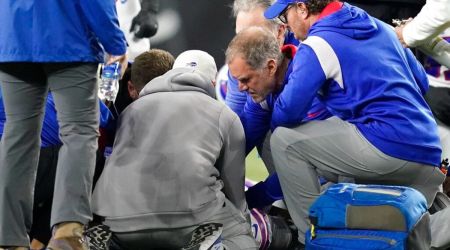 Buffalo Bills' Damar Hamlin is examined during the first half of an NFL football game against the Cincinnati Bengals, Monday, Jan. 2, 2023, in Cincinnati. The game has been postponed after Buffalo Bills' Damar Hamlin collapsed, NFL Commissioner Roger Goodell announced. (AP Photo/Joshua A. Bickel)