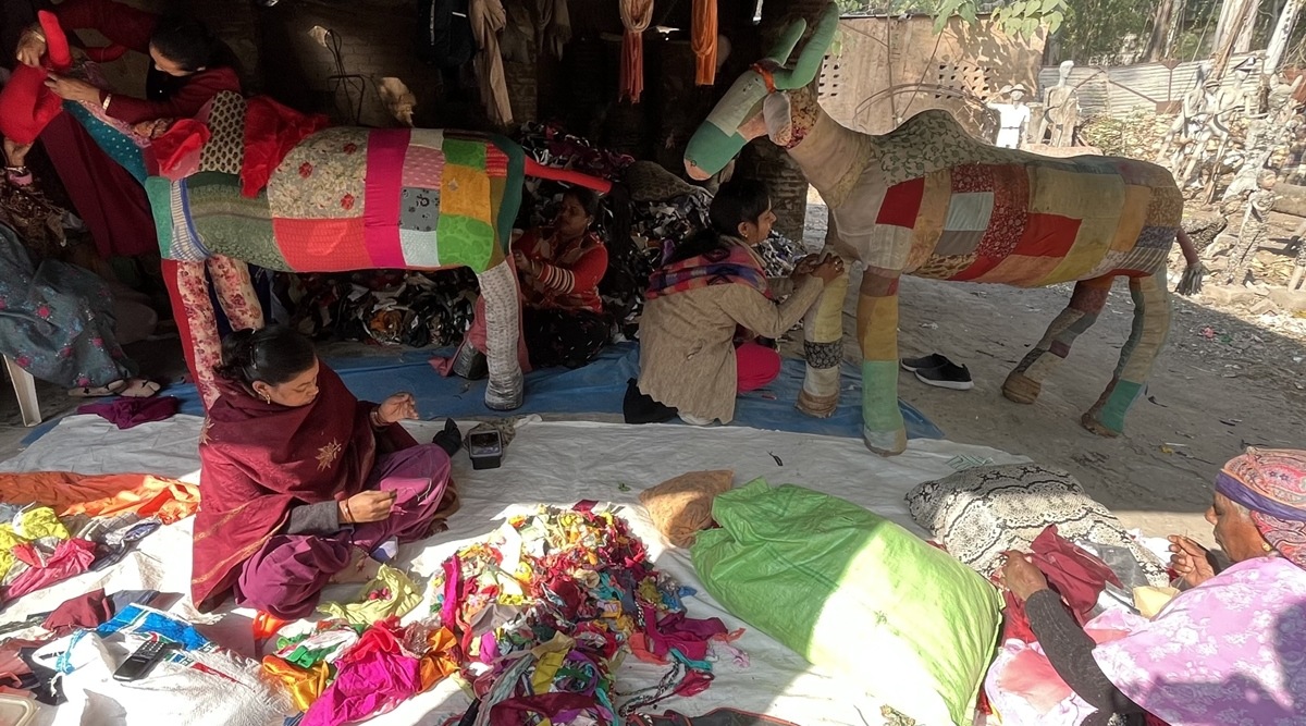 Artists prepare for the G20 meet at Rock Garden in Chandigarh. Express